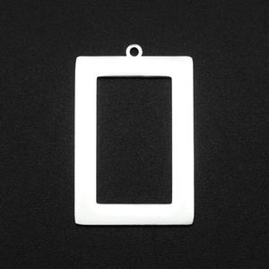 Detailed view of rectangular stainless steel frame pendant with top ring for DIY jewelry