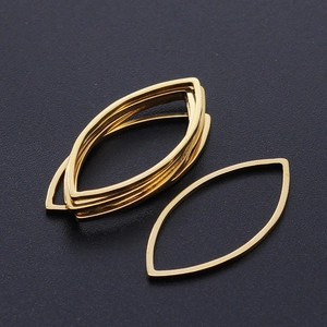 Macro detail of gold marquise metal frames for DIY jewelry making and resin crafts