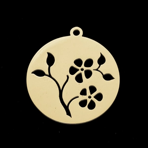 Detailed view of a gold-plated circular镂空 floral pendant featuring delicate leaf and flower motifs