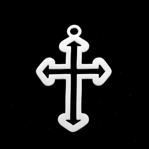 Detailed view of silver stainless steel cutout cross pendant for DIY jewelry making