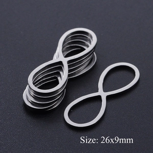 Detail view of infinity stainless steel charms for DIY jewelry measuring 26x9mm