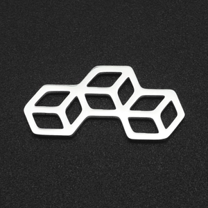 Close-up of geometric stainless steel cubic pendant with interlinked wireframe structure