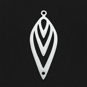 Macro shot of silver cutout stainless steel leaf pendant with double hanging loops