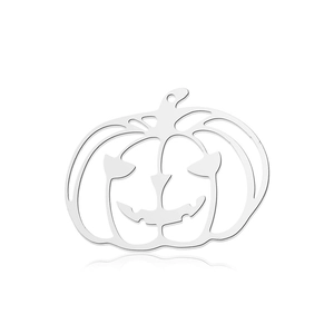 Macro shot of silver pumpkin pendant with hollow design for DIY jewelry making