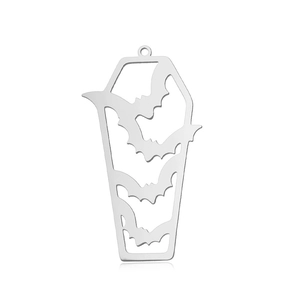 Macro detail of coffin shaped stainless steel pendant with hollow bat design