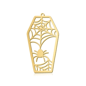 Detailed macro view of a gold-plated coffin pendant with a spider web hollow design