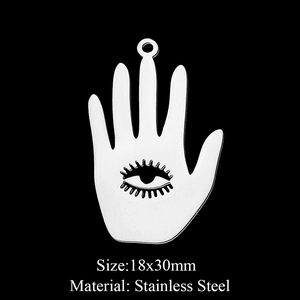 Macro shot of 18x30mm Hamsa hand stainless steel pendant with hollow eye detail