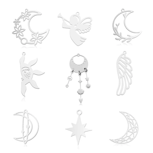 Nine silver stainless steel celestial pendants including sun moon and angel wing charms