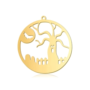 Macro detail of golden stainless steel Halloween pumpkin ghost pendant with hollow design