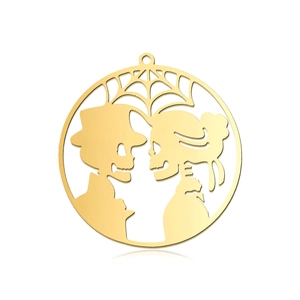 Macro view of a gold skull couple pumpkin head pendant with intricate spider web detail