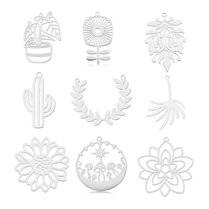 9-piece set of hollowed-out stainless steel charms featuring botanical and nature motifs