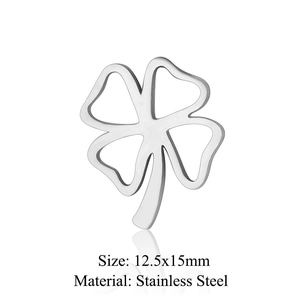 Macro shot of silver stainless steel four-leaf clover pendant with 12.5x15mm dimensions