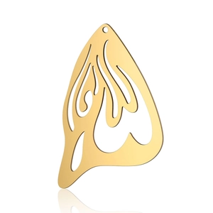Macro view of gold hollow butterfly wing pendant with polished stainless steel surface