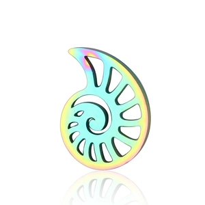 Macro detail of a spiral nautilus steel pendant with a vibrant rainbow gradient finish
