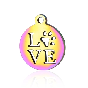 Macro detail of a rainbow titanium steel round pendant featuring a hollow Love heart paw