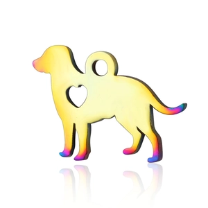 Macro shot of iridescent rainbow-plated stainless steel dog pendant with heart cut-out detail