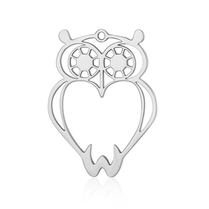 Macro view of polished stainless steel owl pendant with hollow out minimalist design