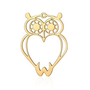 Close-up of golden hollow owl pendant in stainless steel for DIY jewelry making