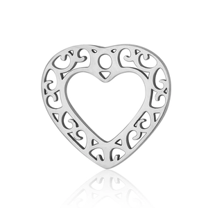 Detailed macro view of hollow heart pendant with silver filigree vine patterns
