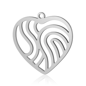 Macro shot of polished stainless steel heart pendant with abstract hollow design