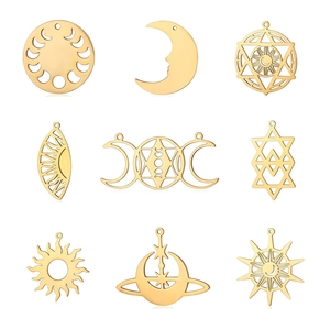 Detailed set of golden celestial charms featuring sun, moon, stars, and geometric symbols