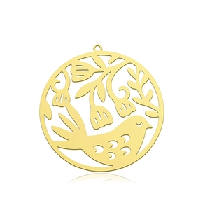 Detailed view of a gold-plated stainless steel circular pendant with bird and flower cutout