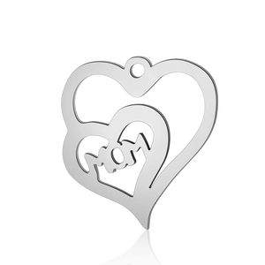 Detail of a heart-shaped stainless steel pendant with MOM engraving and inner heart
