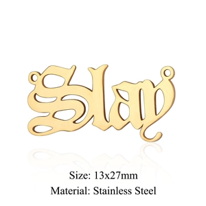 Detailed view of golden Slay letter pendant in gothic font with stainless steel specs