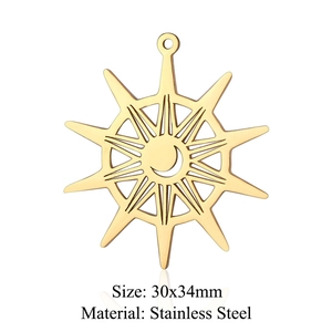 Macro shot of 30x34mm gold stainless steel sun star pendant with crescent moon cutout