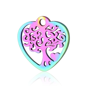 Macro shot of heart-shaped Tree of Life pendant with rainbow colorful plating finish