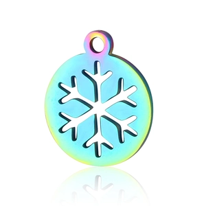 Macro detail of rainbow plated stainless steel snowflake pendant with vibrant metallic finish