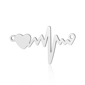 Macro view of silver heartbeat pendant with heart shape and dual connection rings