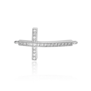 Detailed macro view of a silver horizontal cross connector with pavé zircon for jewelry