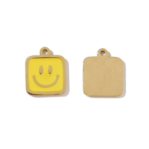 Macro view showing both sides of a gold-plated square smiley face pendant accessory