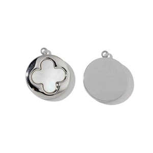 Detailed macro view of silver clover mother-of-pearl pendant showing front and back