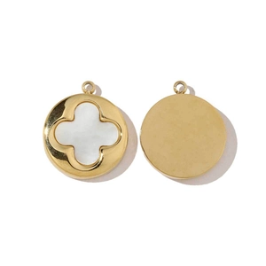 Detail of 18K gold plated clover charm with mother of pearl shell inlay and polished back