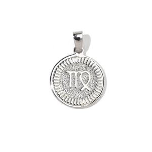 Macro detail of silver round Virgo zodiac coin charm with sandblasted texture and engraving