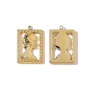 Detailed view of two gold rectangular pendants featuring female profile silhouettes