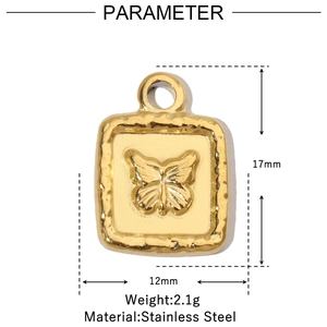 Detail view of square gold butterfly pendant with hammered texture and dimensions