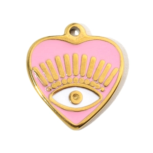 Detailed macro of a gold-plated heart pendant with pink enamel and evil eye motif