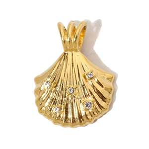 Detailed view of a gold-toned scallop shell pendant with inlaid white zircon stones