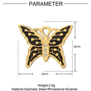 Detail view of butterfly pendant with enamel wings and rhinestones showing 24x20mm size