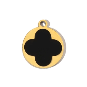 Detailed view of a round gold-plated pendant with a black clover enamel inlay design