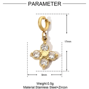 Detailed view of a gold flower charm in stainless steel with zircon and dimensions