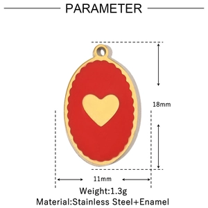 Detail view of a 18x11mm oval gold pendant with red enamel and heart design