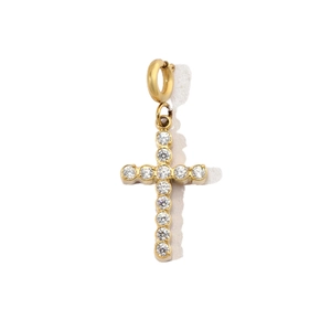Detailed view of a gold-plated cross pendant with shimmering zircon pavé stones