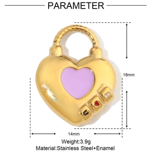 Macro detail of a 14mm pink enamel heart lock pendant in golden stainless steel