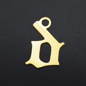 Detailed macro view of a gold-plated stainless steel letter D pendant in Old English font