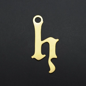 Detailed view of the gold-plated gothic letter h pendant for custom DIY jewelry making