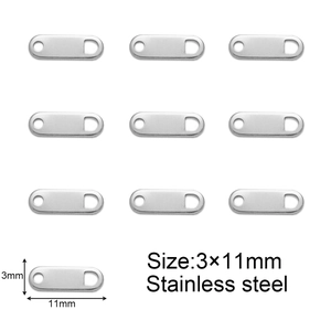 Macro detail of 3mm x 11mm stainless steel oval extension chain tags for DIY jewelry